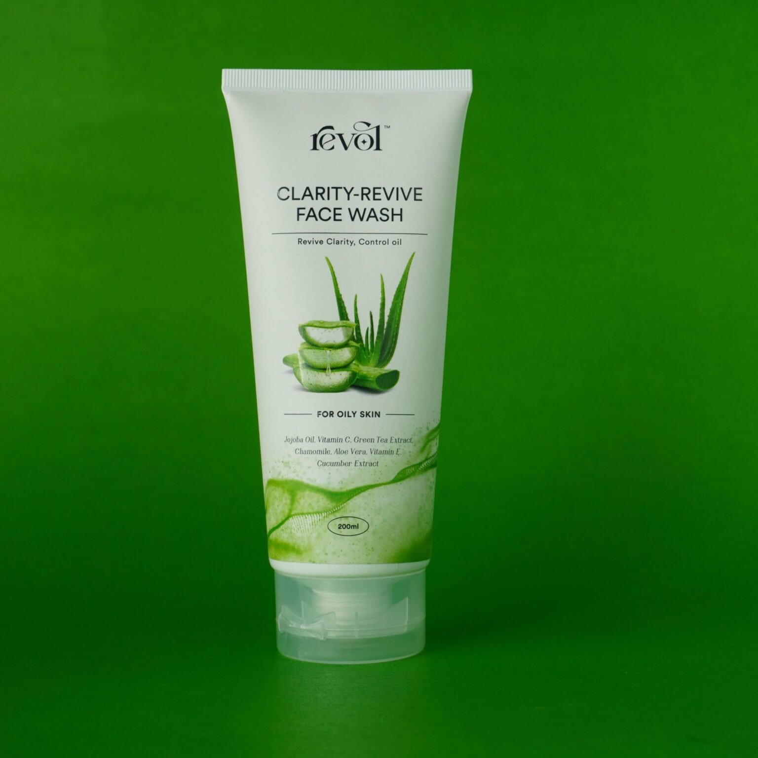 Clarity-Revive Face Wash tube against a green background, perfect for oily skin.