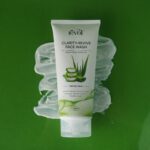 Clarity-Revive Face Wash tube for oily skin on a green background